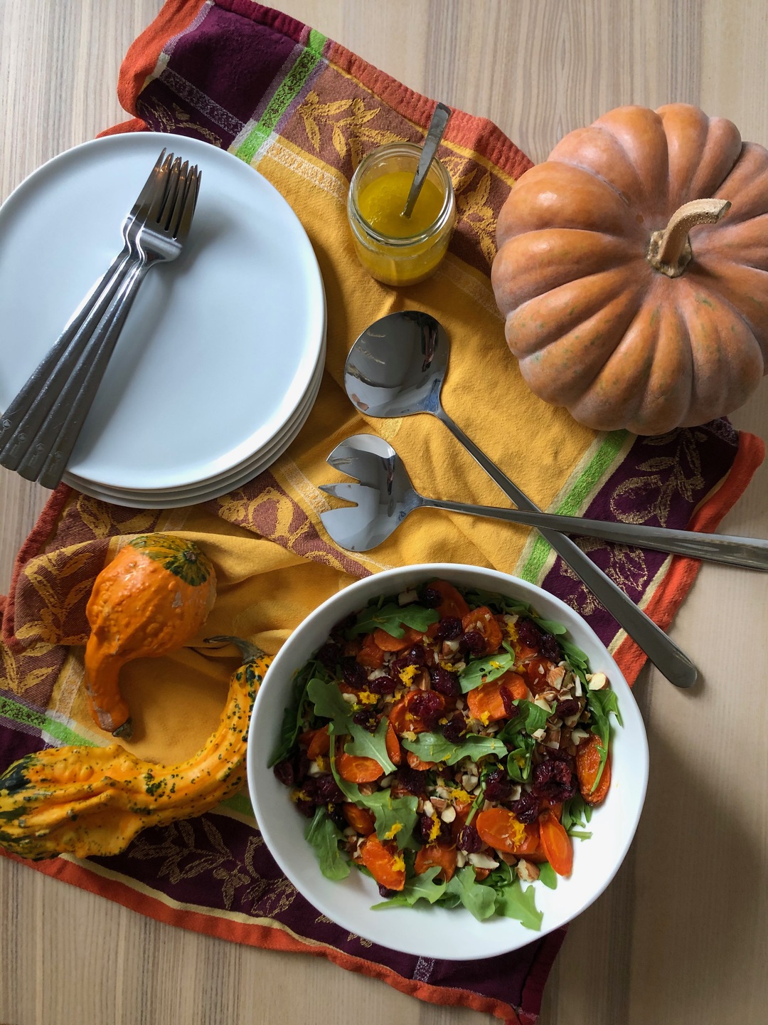 Salad with carrots, cranberries, and orange dressing