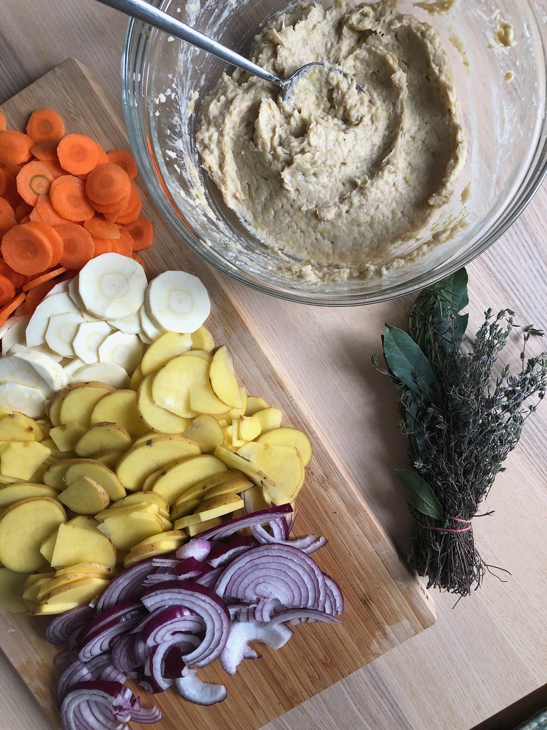 Carrots, parsnips, potatoes, red onion, and white bean purée