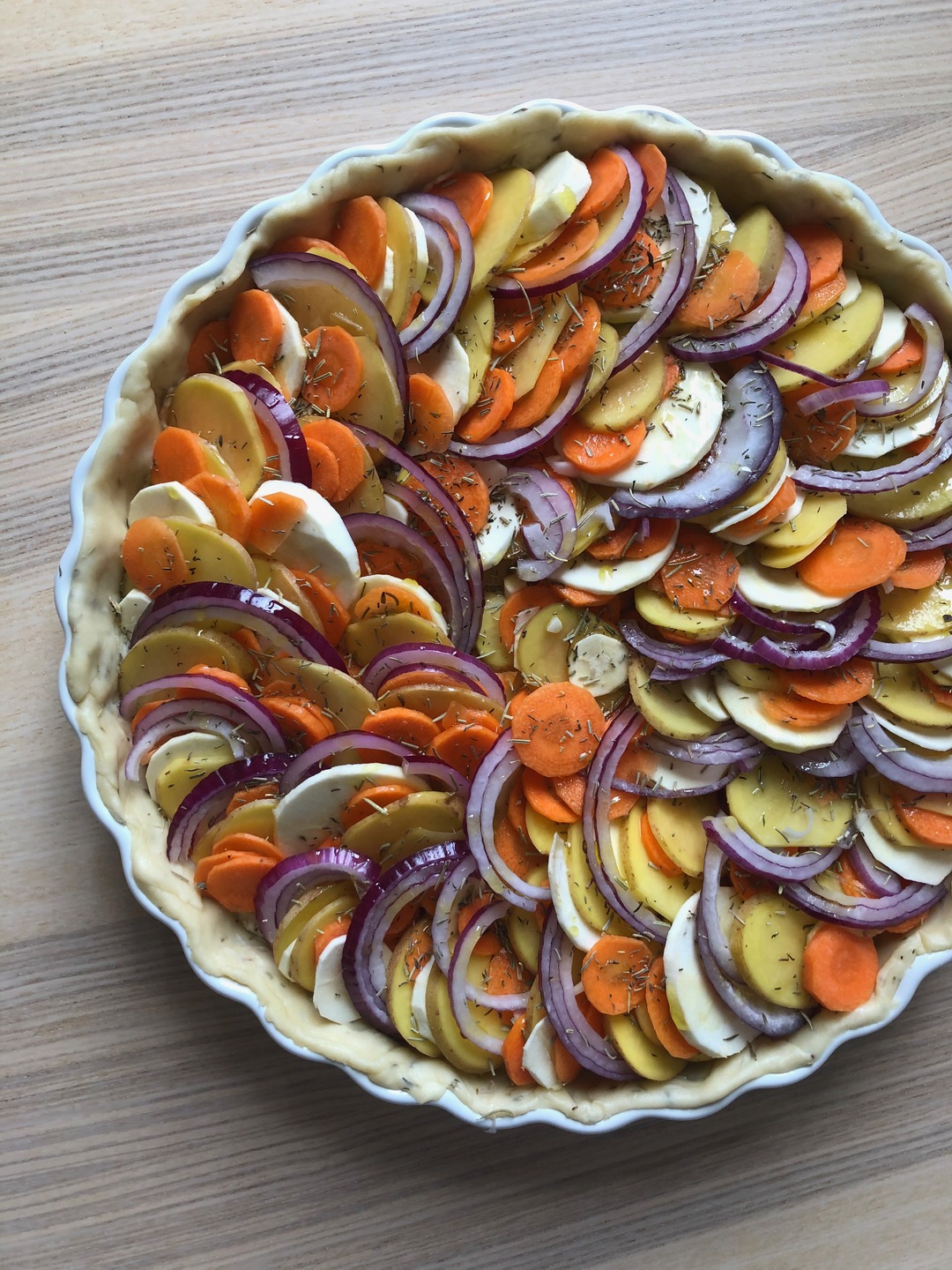 Root vegetable tart before baking