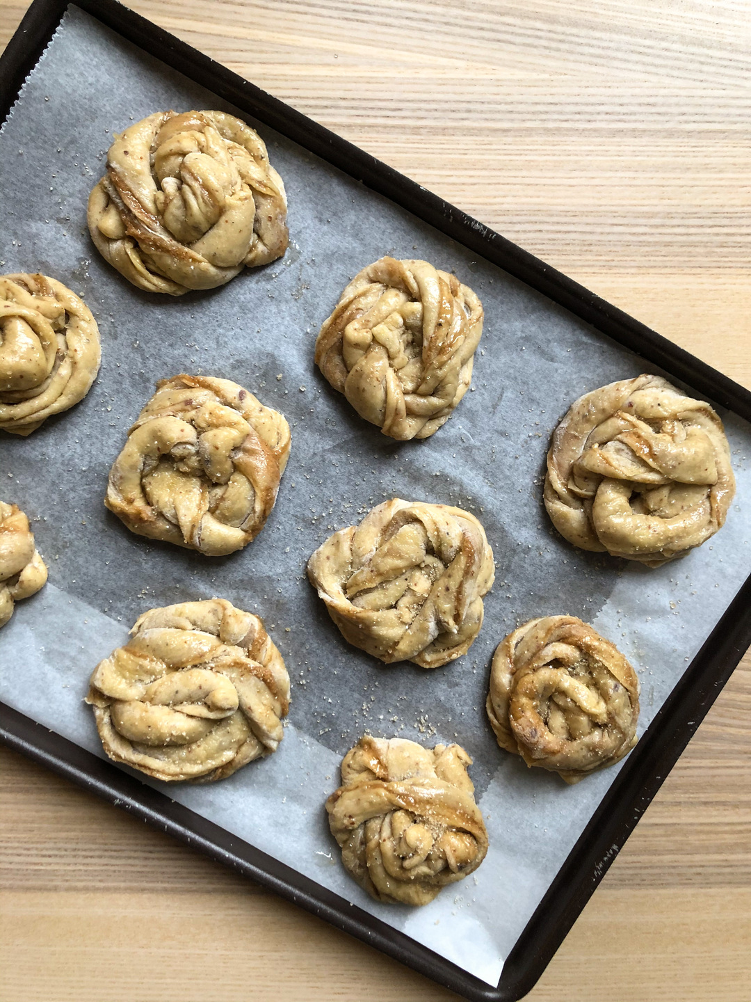 raw cardamom buns before baking