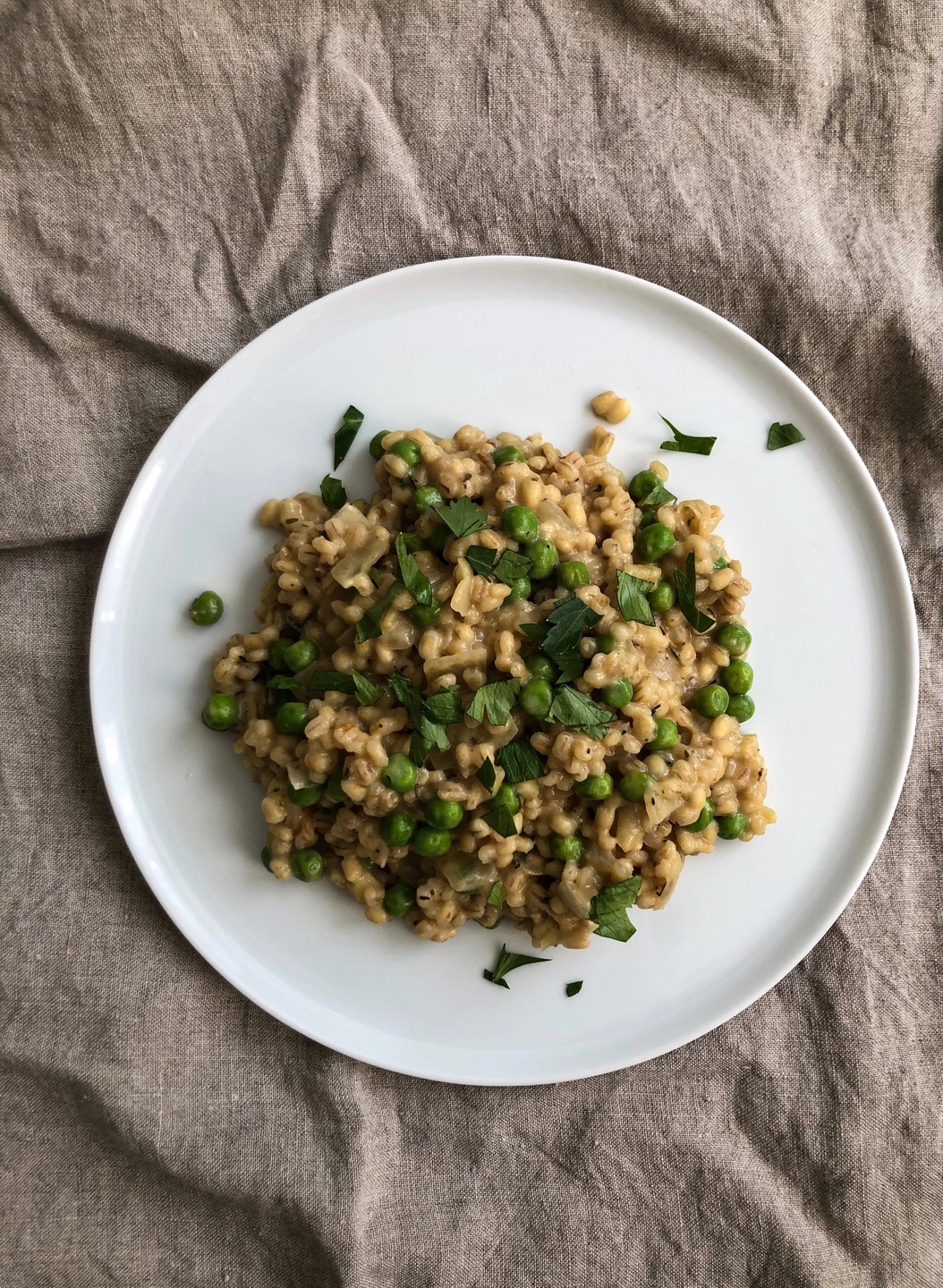 barley risotto with garden peas and roasted garlic